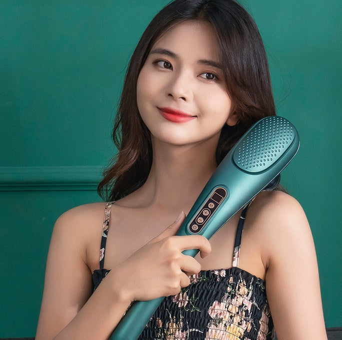 Female model holding New Rechargeable Massager Massage; ergonomic electric massager for personal care and muscle relief.